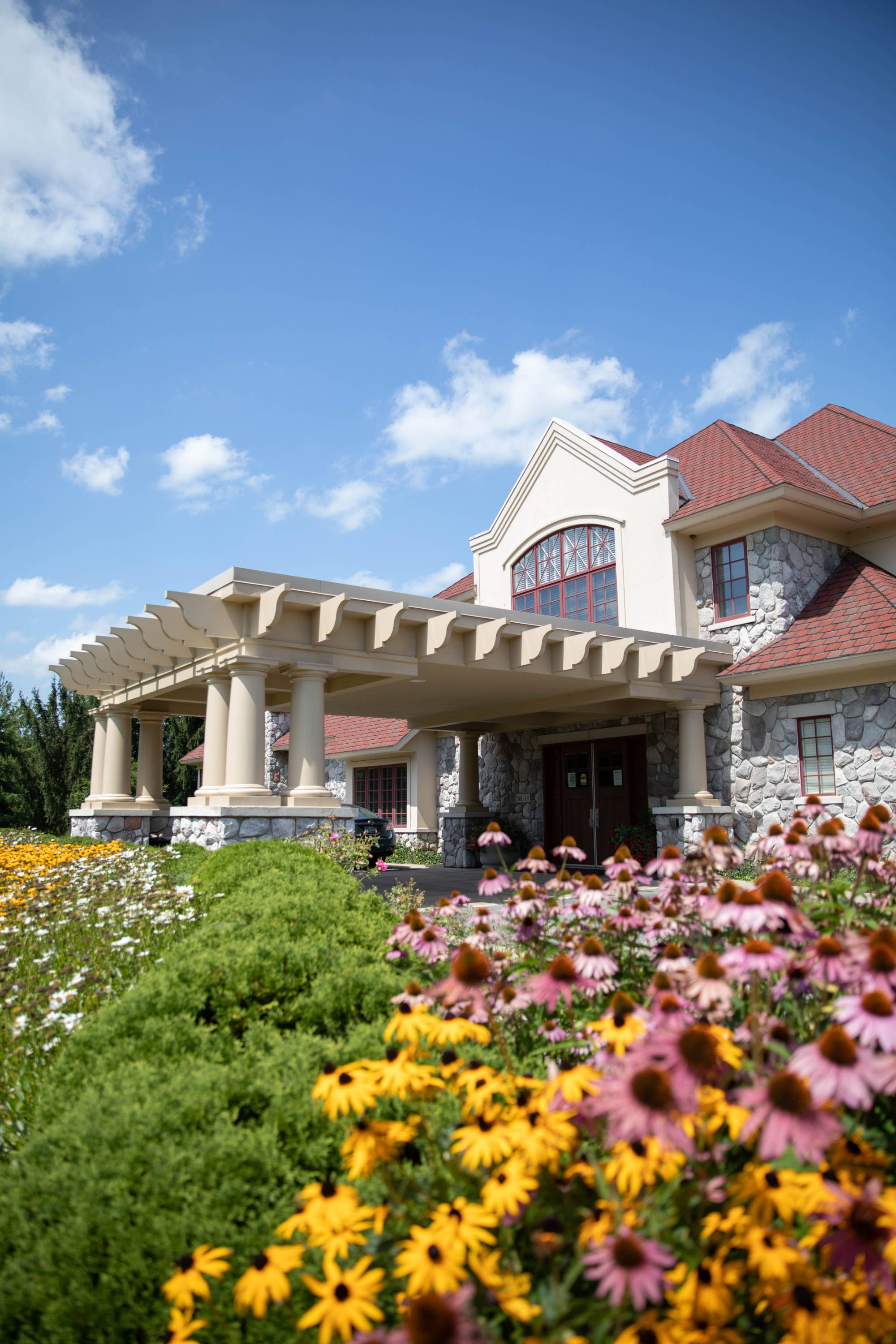 Flowers in front of Alumni House